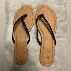 Brown and black sandals